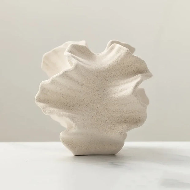 Modern ceramic vase with sculpted wavy petal design – elegant decorative piece for floral arrangements