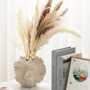 Modern ceramic vase with sculpted wavy petal design – elegant decorative piece for floral arrangements