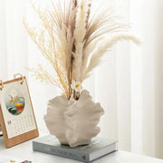 Modern ceramic vase with sculpted wavy petal design – elegant decorative piece for floral arrangements