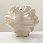 Modern ceramic vase with sculpted wavy petal design – elegant decorative piece for floral arrangements