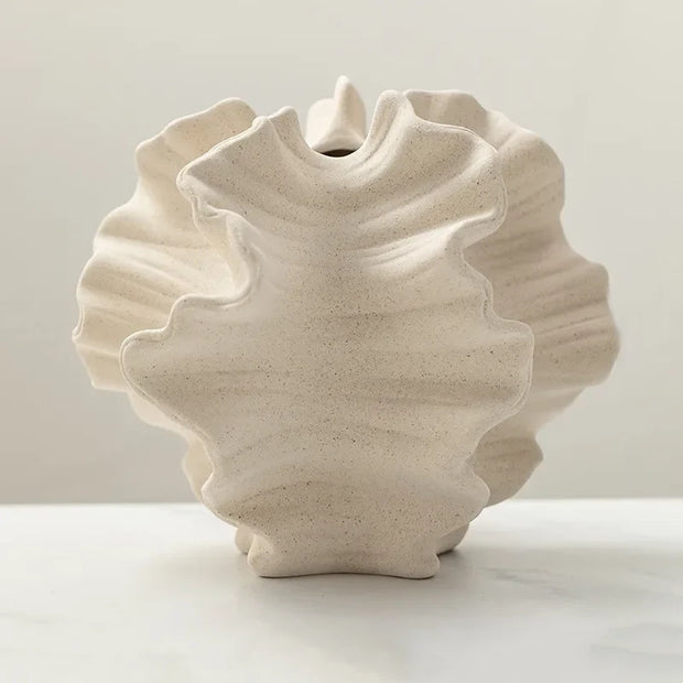 Modern ceramic vase with sculpted wavy petal design – elegant decorative piece for floral arrangements