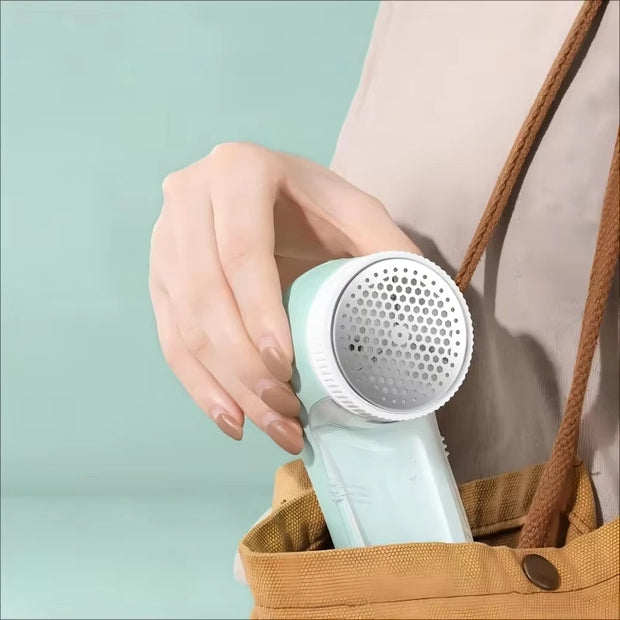 Electric fabric lint remover and pet hair roller